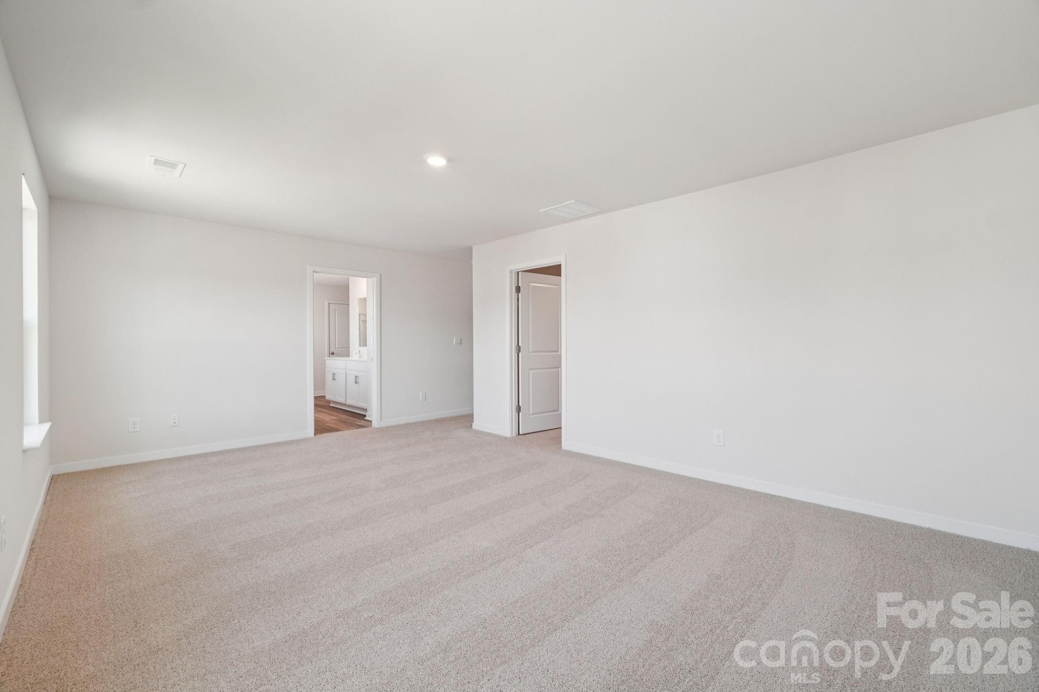 4559 Harris Elliot Road Lincolnton, NC 28092 - Photo 27 of 36 a view of an empty room with wooden floor