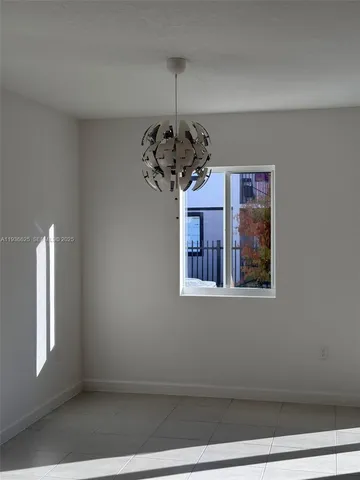 a view of a room with a chandelier