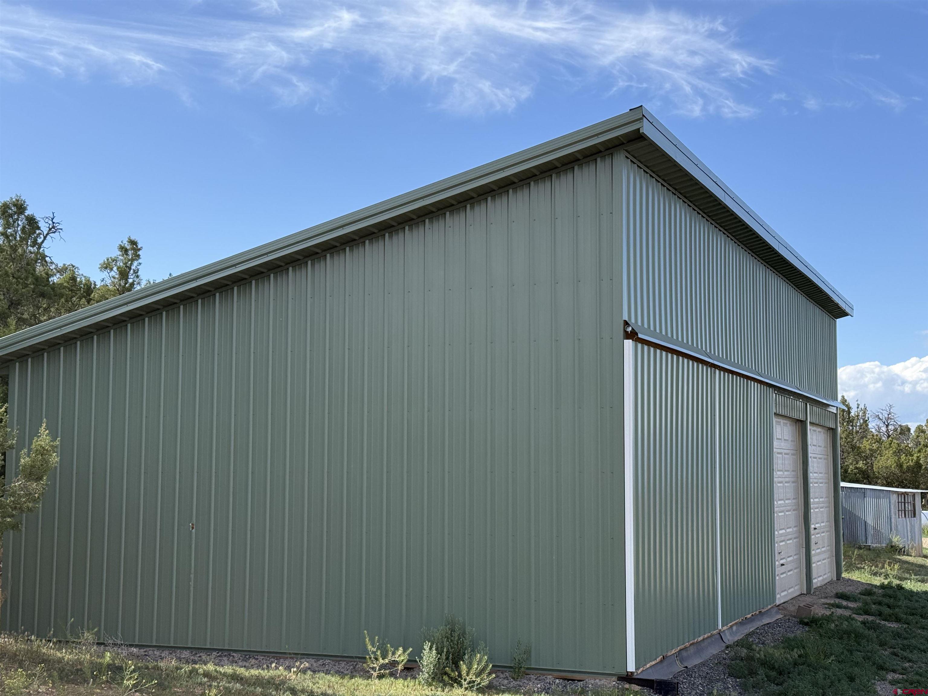 32310 B50 Road Crawford, CO 81415 - Photo 43 of 45 a wooden door with a outdoor space