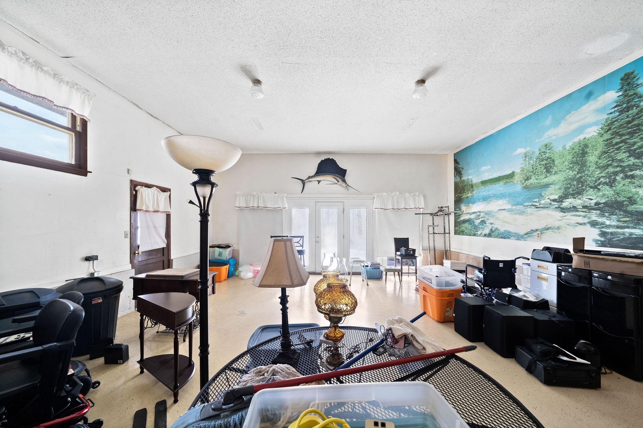 1075 Batson Mill Road Charlotte, TN 37036 - Photo 30 of 43 a living room with furniture and a large window
