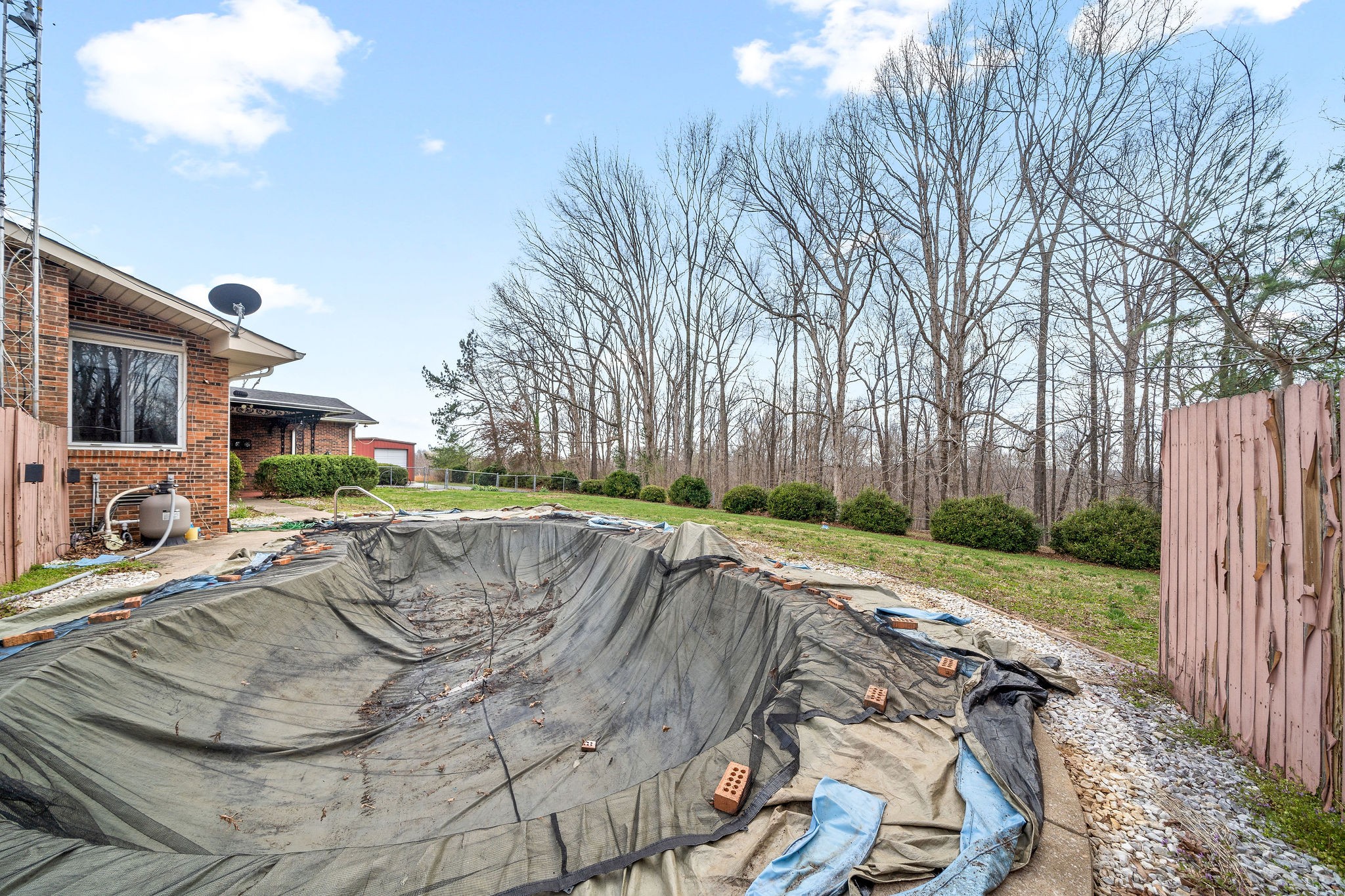 1075 Batson Mill Road Charlotte, TN 37036 - Photo 33 of 43 a view of a backyard with a patio