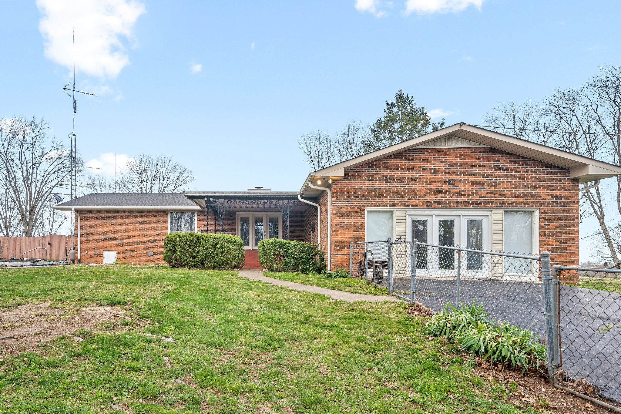 1075 Batson Mill Road Charlotte, TN 37036 - Photo 36 of 43 a view of a house with yard and front view of a house