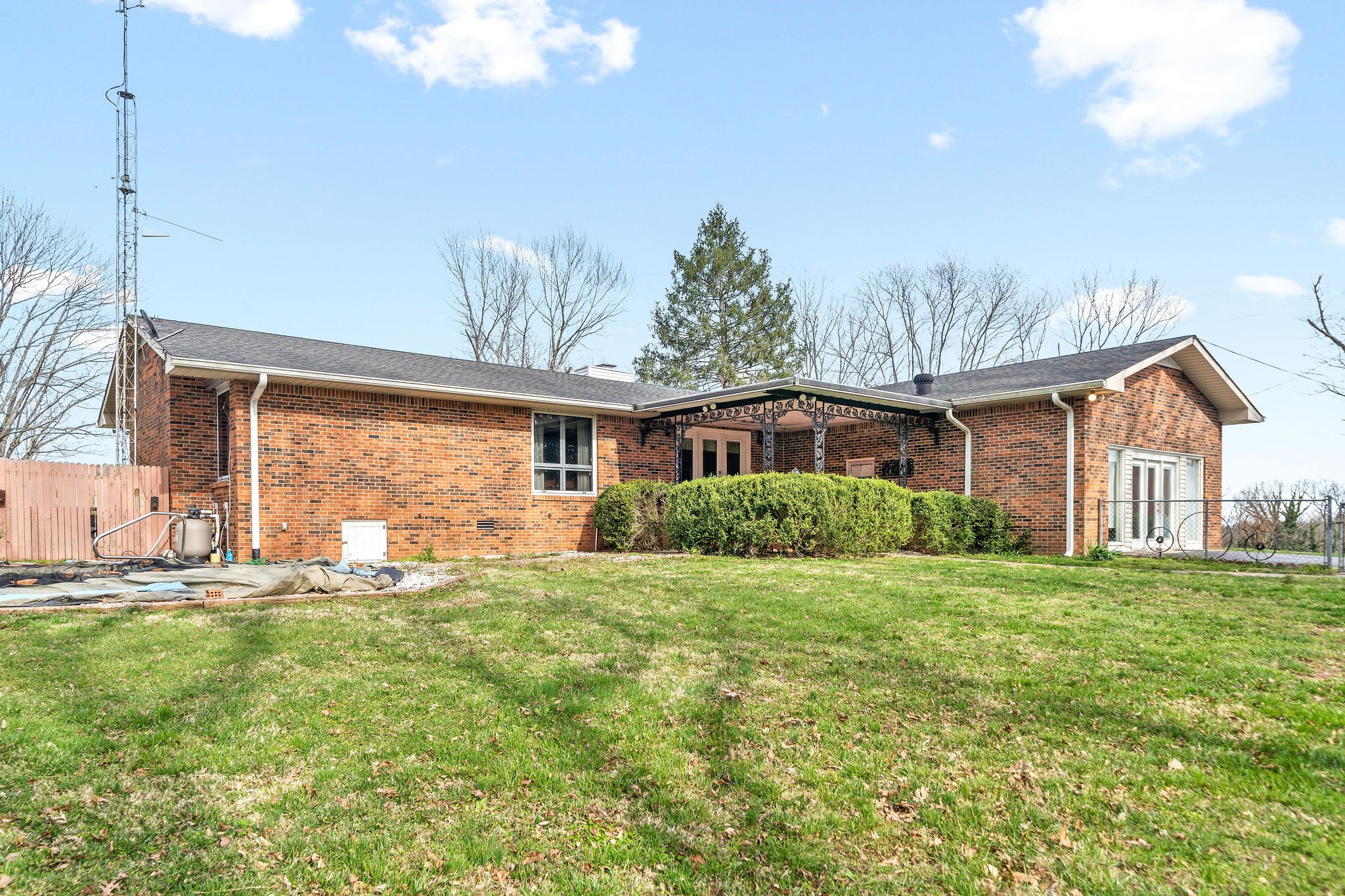1075 Batson Mill Road Charlotte, TN 37036 - Photo 40 of 43 a front view of a house with a yard and trees