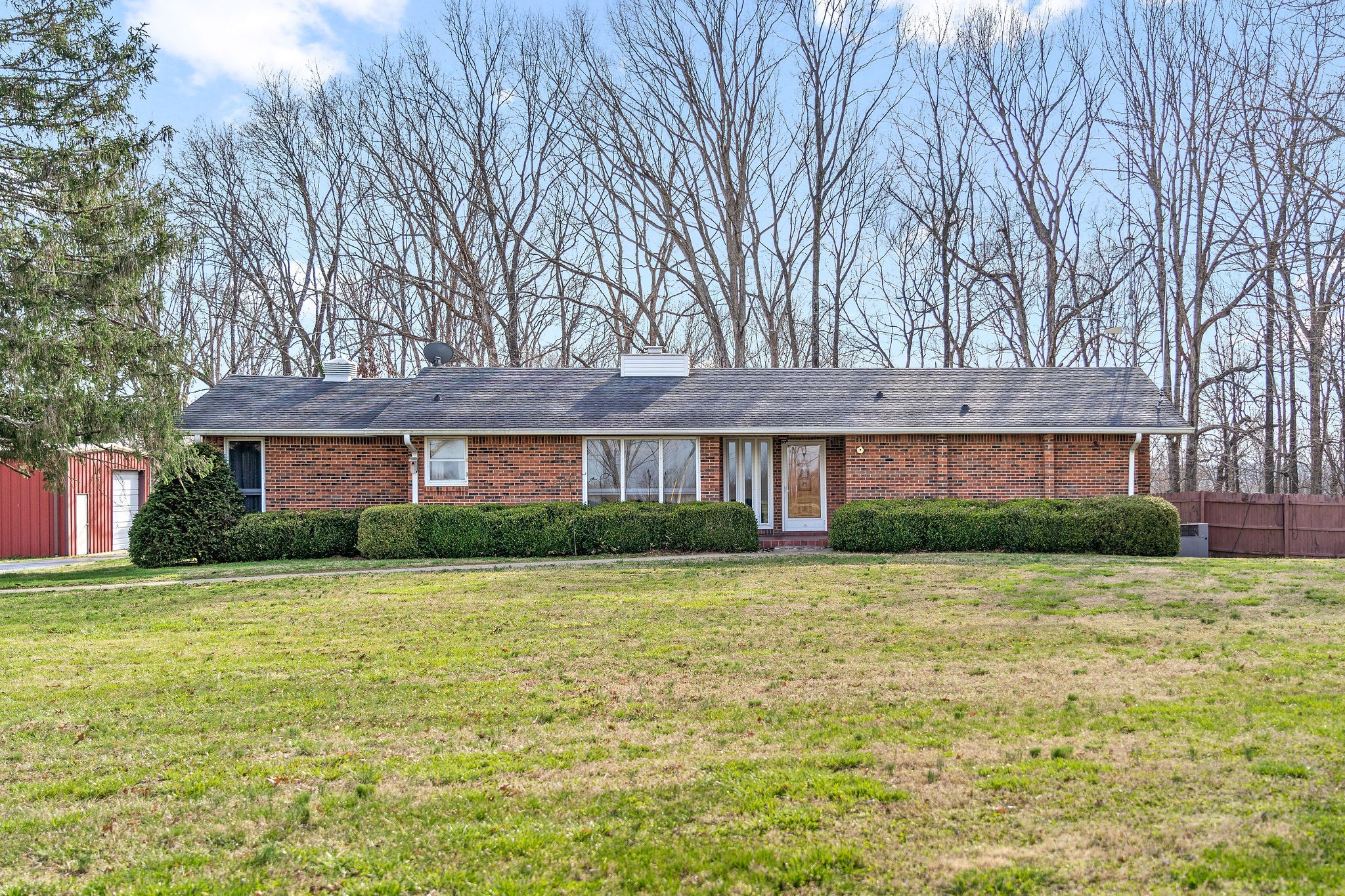 1075 Batson Mill Road Charlotte, TN 37036 - Photo 42 of 43 a front view of a house with a yard