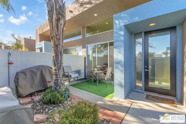 a backyard of a house with seating space