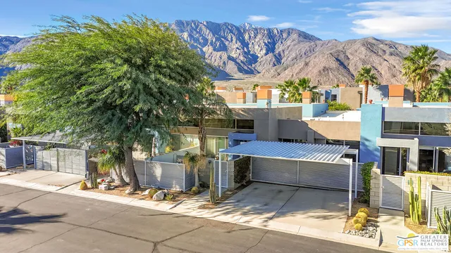 a view of house with outdoor space and seating area