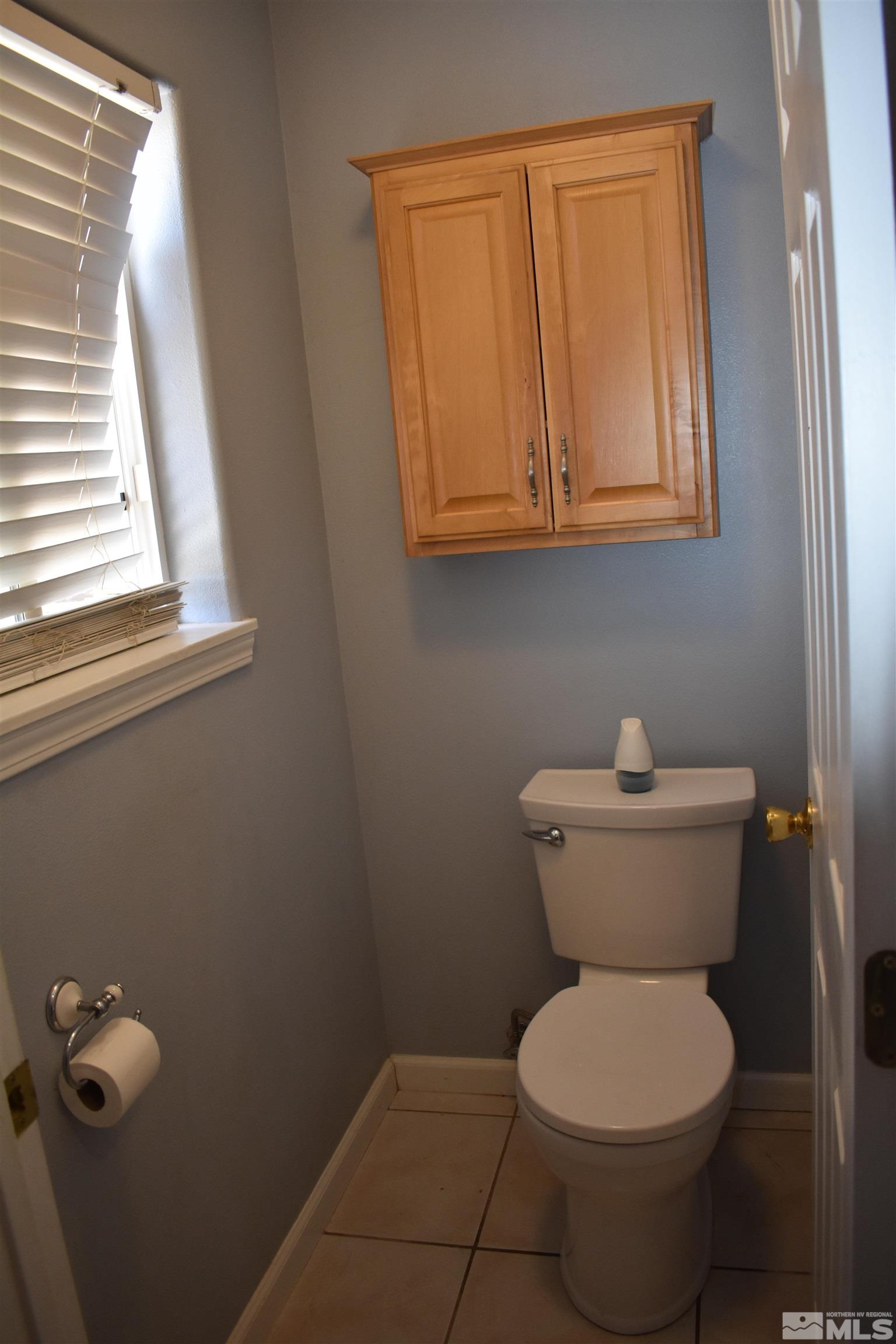 1737 Dee Jay Lane Minden, NV 89423 - Photo 26 of 40 a bathroom with a toilet