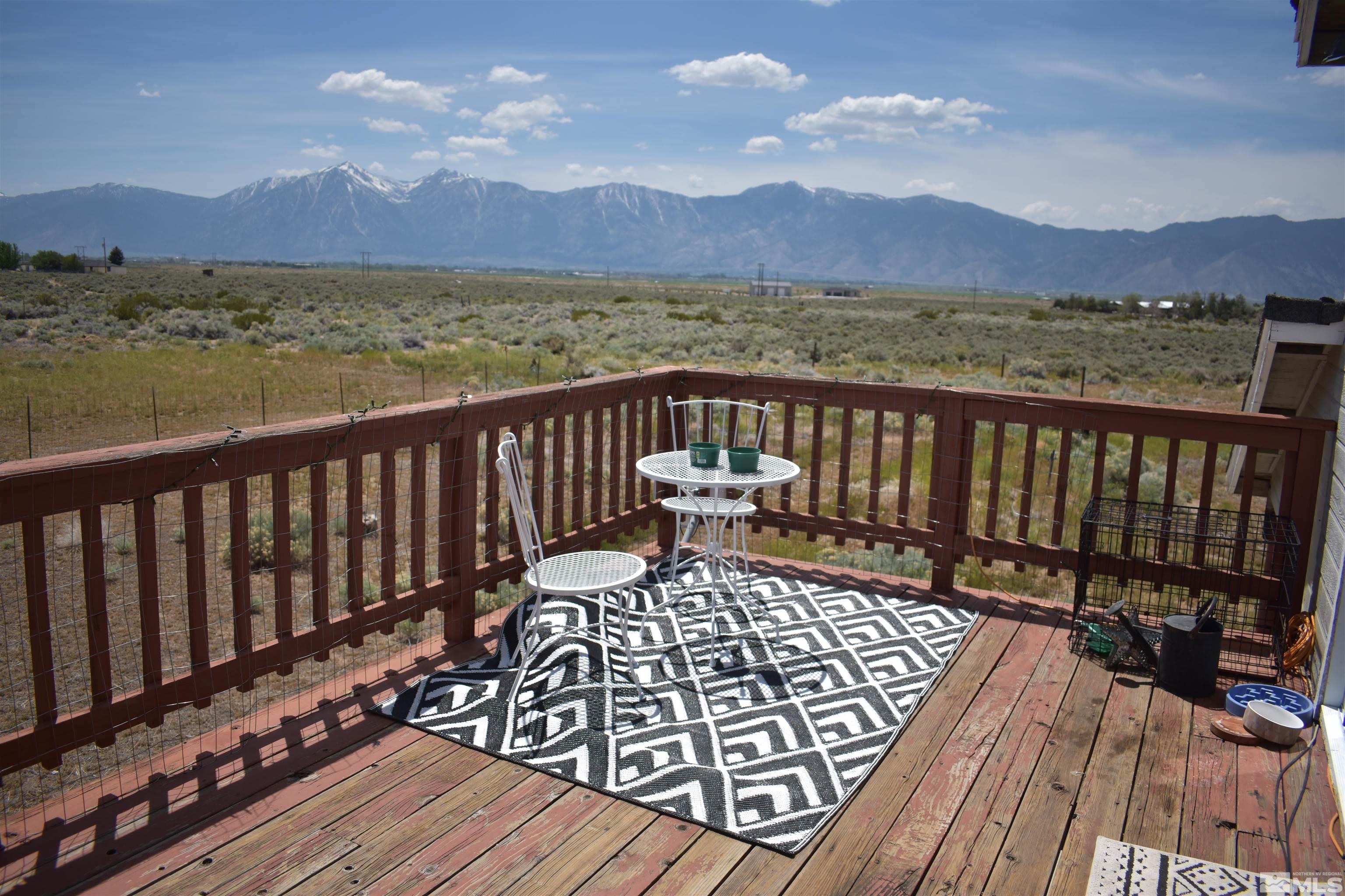 1737 Dee Jay Lane Minden, NV 89423 - Photo 28 of 40 a view of balcony with wooden floor and a floor to ceiling window