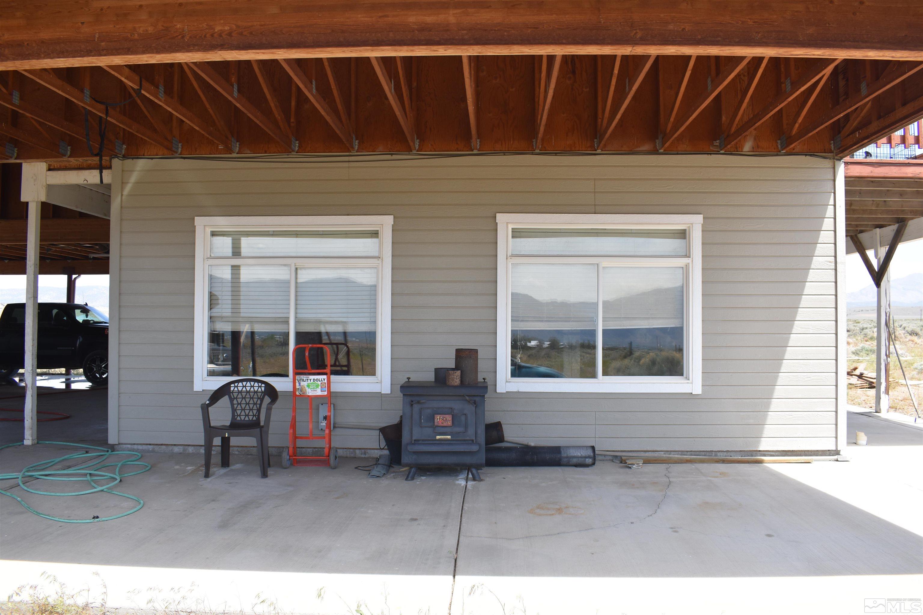 1737 Dee Jay Lane Minden, NV 89423 - Photo 5 of 40 a backyard of a house with table and chairs
