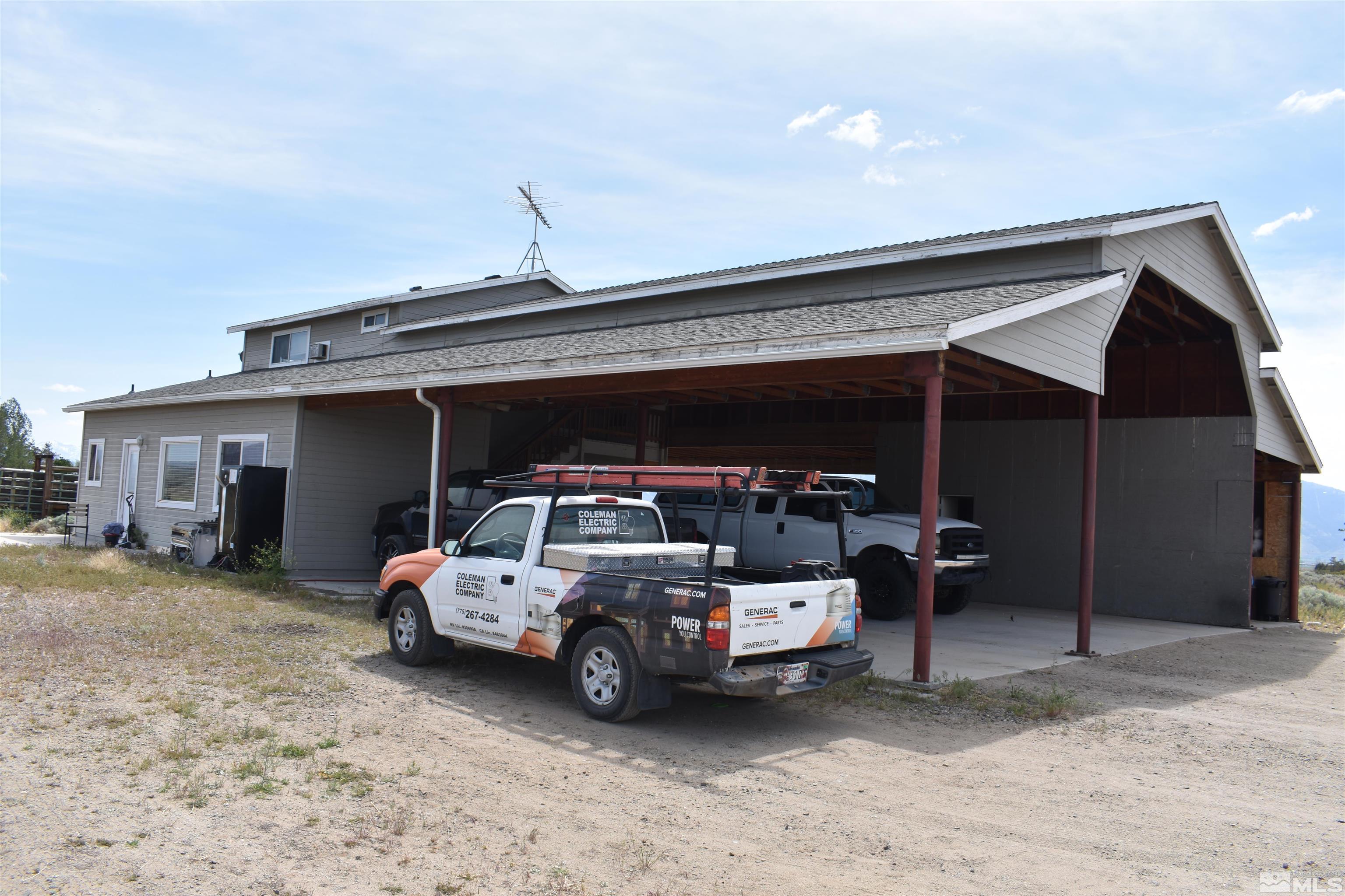 1737 Dee Jay Lane Minden, NV 89423 - Photo 6 of 40 a car parked in front of house