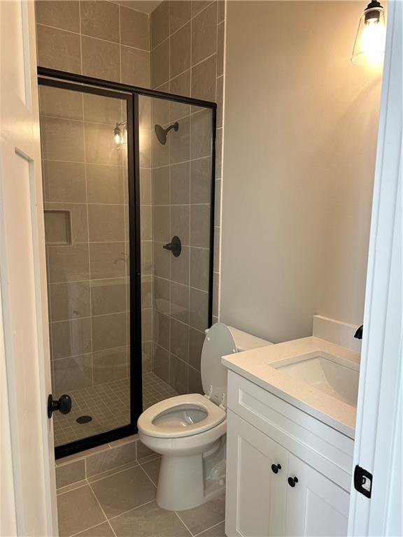 967 Cable Road Waleska, GA 30183 - Photo 13 of 27 a bathroom with a shower a toilet and a sink