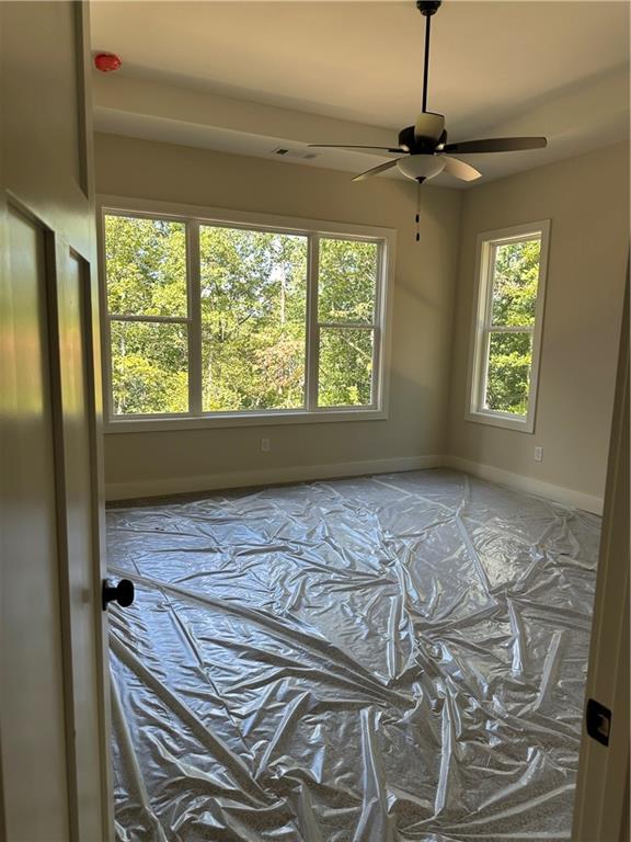 967 Cable Road Waleska, GA 30183 - Photo 18 of 27 a view of an empty room and window