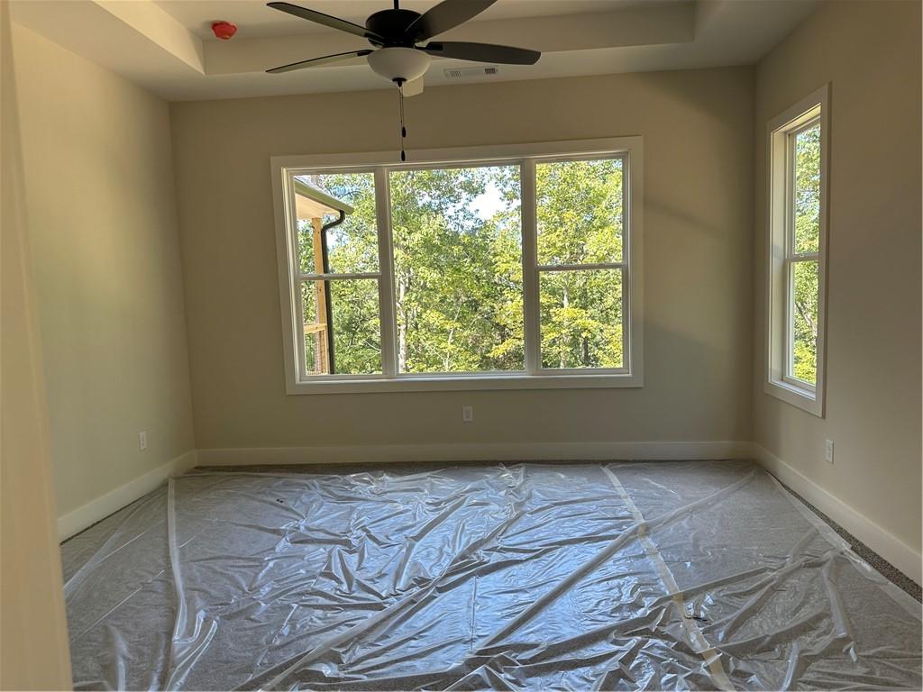 967 Cable Road Waleska, GA 30183 - Photo 23 of 27 a view of an empty room with a window
