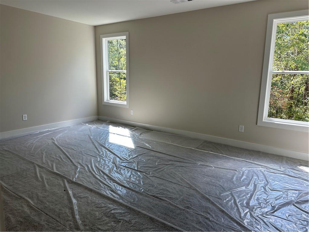 967 Cable Road Waleska, GA 30183 - Photo 7 of 27 a view of empty room with window