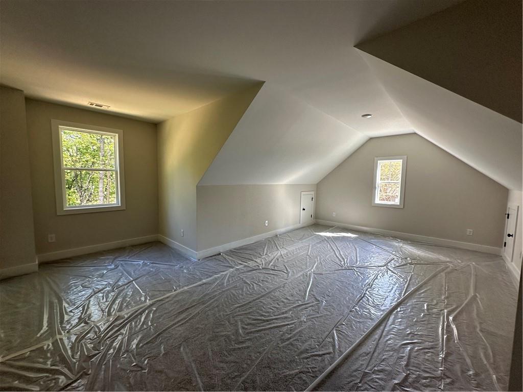 967 Cable Road Waleska, GA 30183 - Photo 9 of 27 a view of a big room with windows