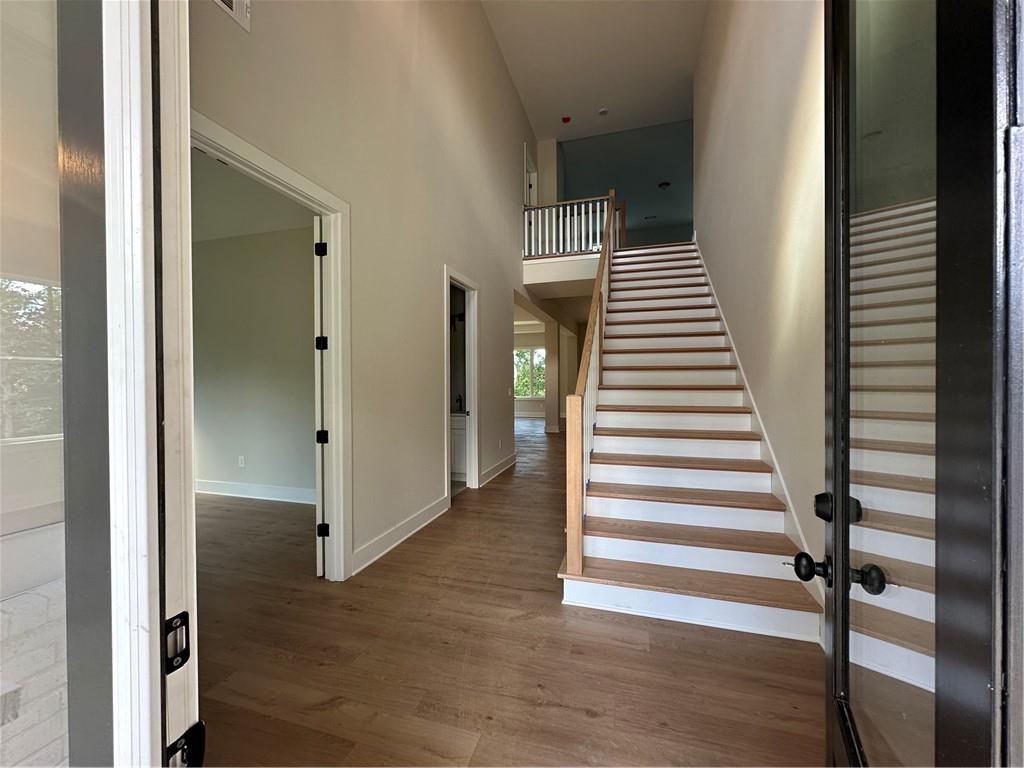 967 Cable Road Waleska, GA 30183 - Photo 10 of 27 a view of a hallway with wooden floor and entryway