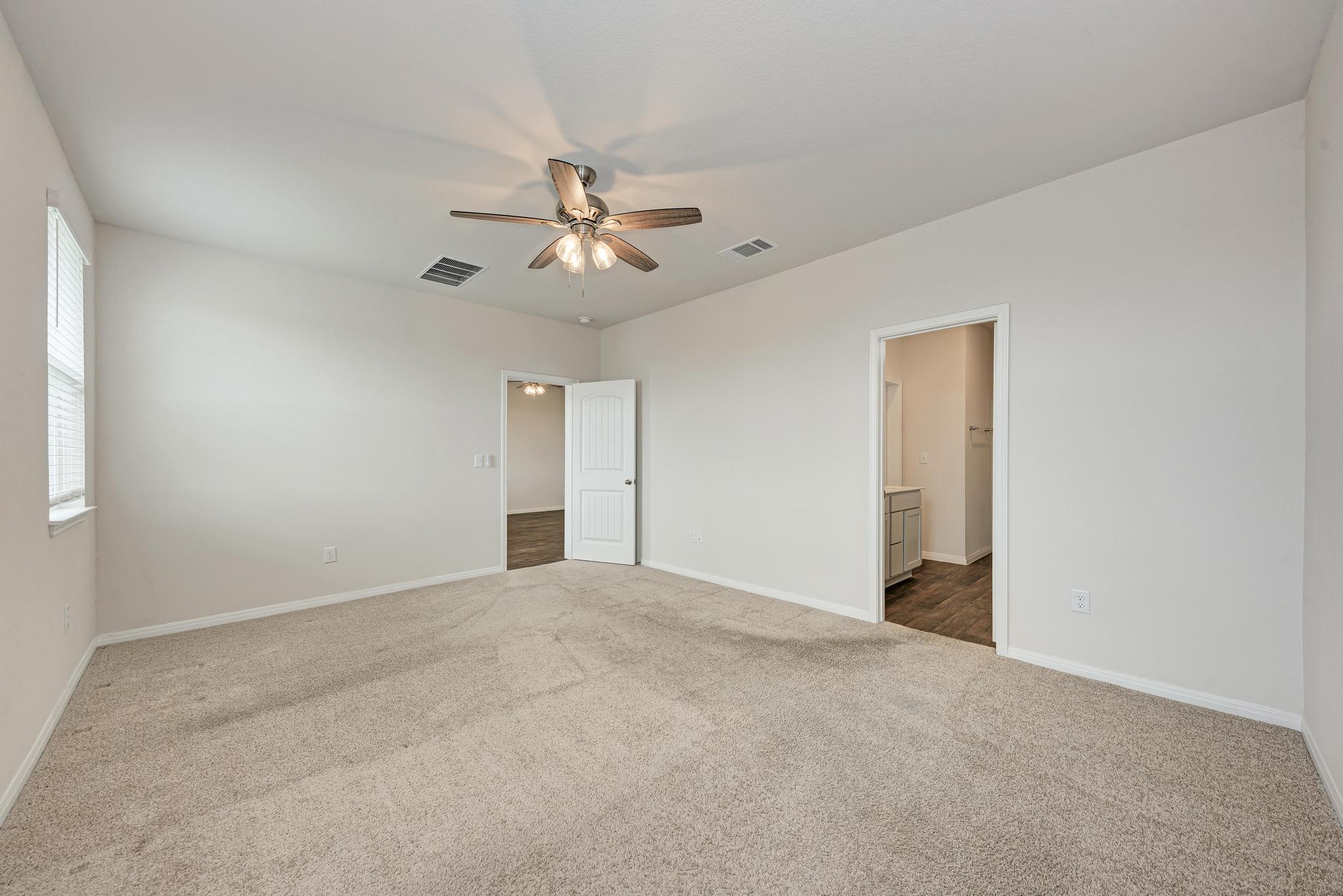 208 Abby Road Georgetown, TX 78626 - Photo 25 of 40 a view of a big room with carpet