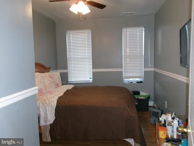 a bathroom with a shower and a window