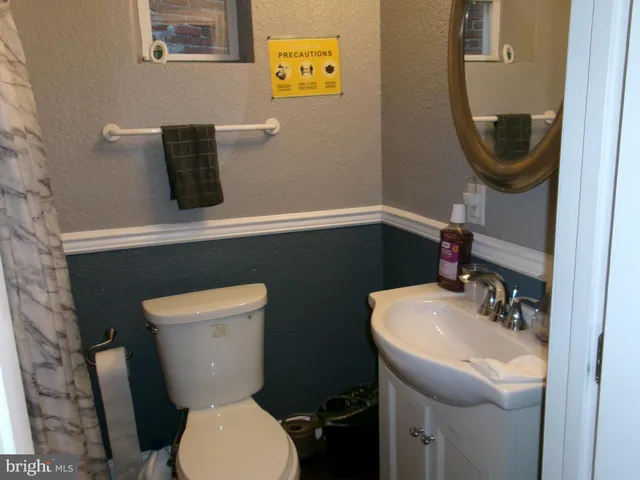 a room with furniture and wooden floor