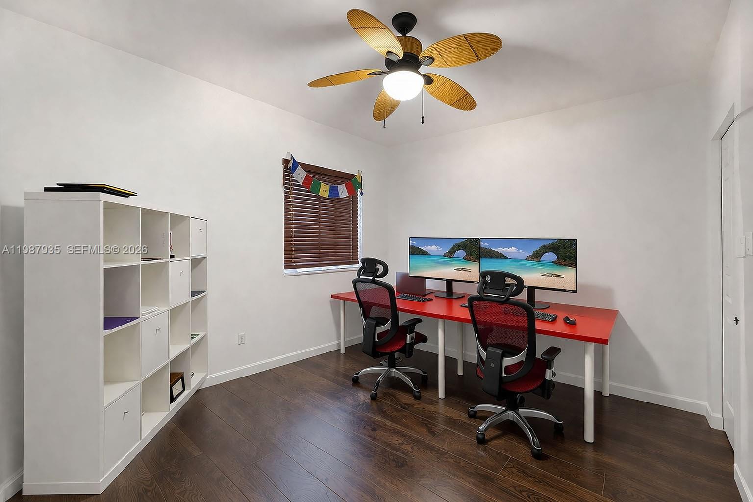16479 Southwest 50th Terrace Miami, FL 33185 - Photo 30 of 51 a view of a dining room with furniture and wooden floor