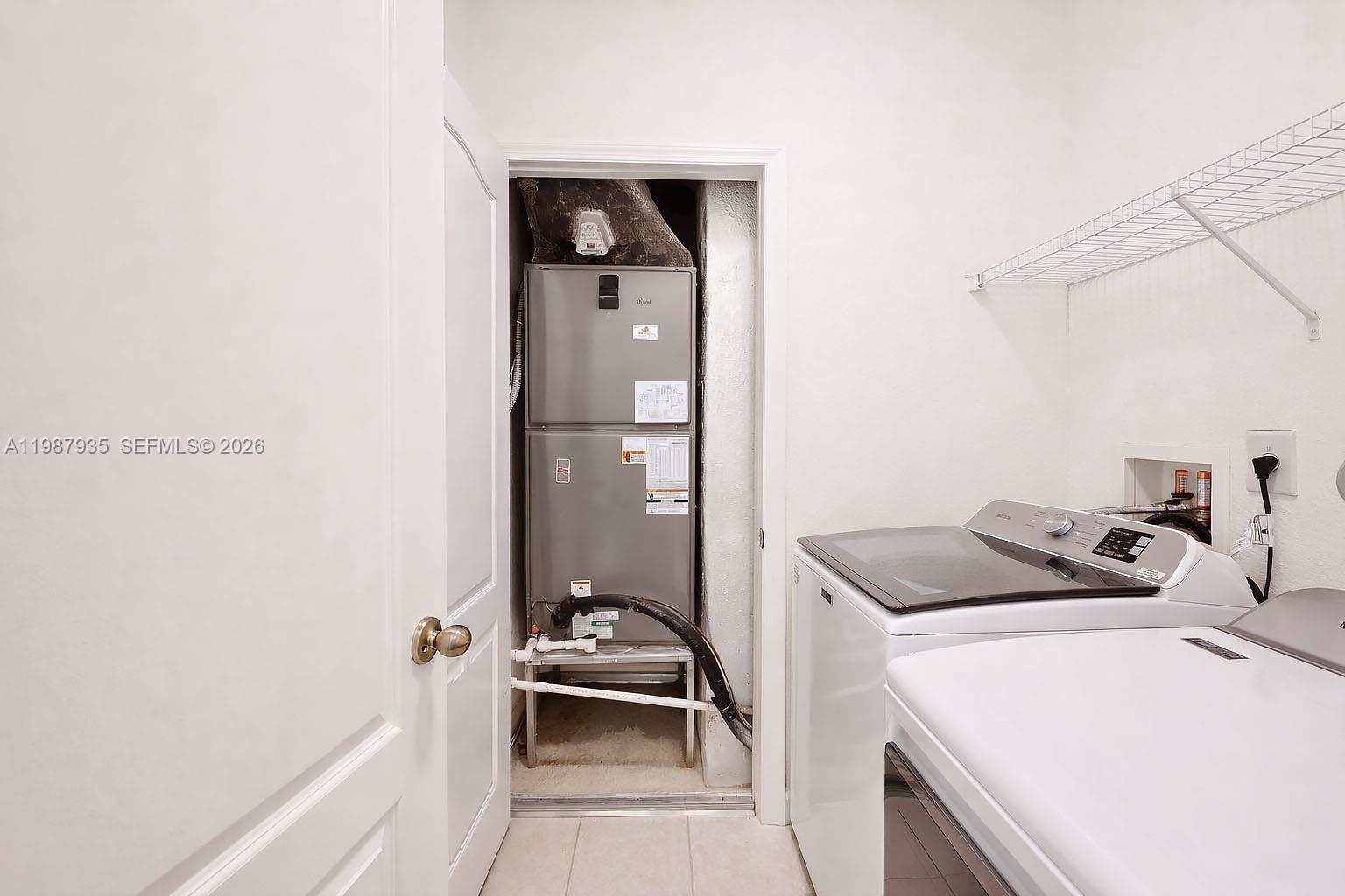 16479 Southwest 50th Terrace Miami, FL 33185 - Photo 42 of 51 a room with storage and utility