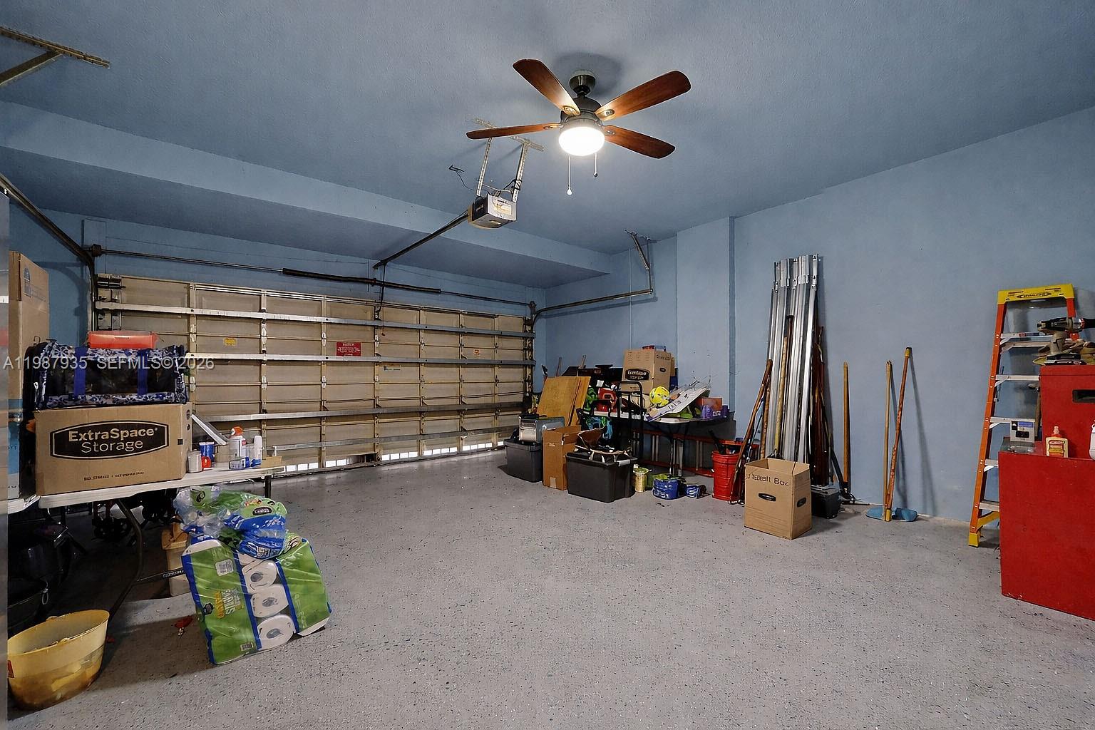 16479 Southwest 50th Terrace Miami, FL 33185 - Photo 43 of 51 a view of a room with gym equipment