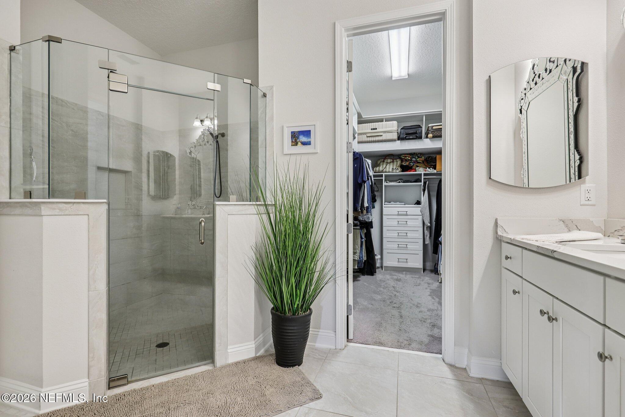 97 Rialto Drive Ponte Vedra, FL 32081 - Photo 16 of 48 a bathroom with a shower and a sink