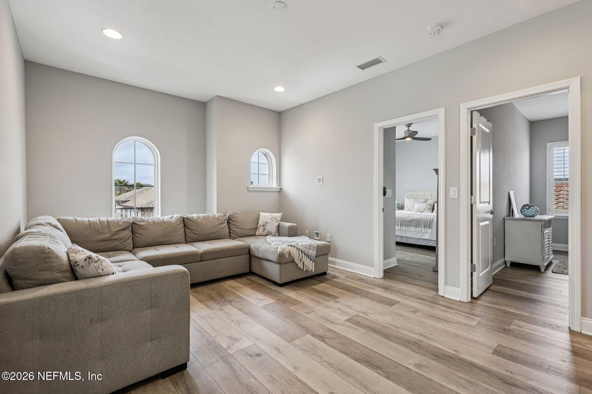 97 Rialto Drive Ponte Vedra, FL 32081 - Photo 18 of 48 a living room with furniture and wooden floor