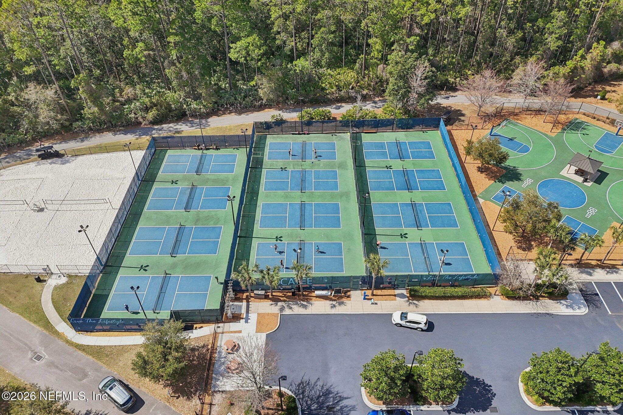 97 Rialto Drive Ponte Vedra, FL 32081 - Photo 37 of 48 an aerial view of a residential apartment building with a yard