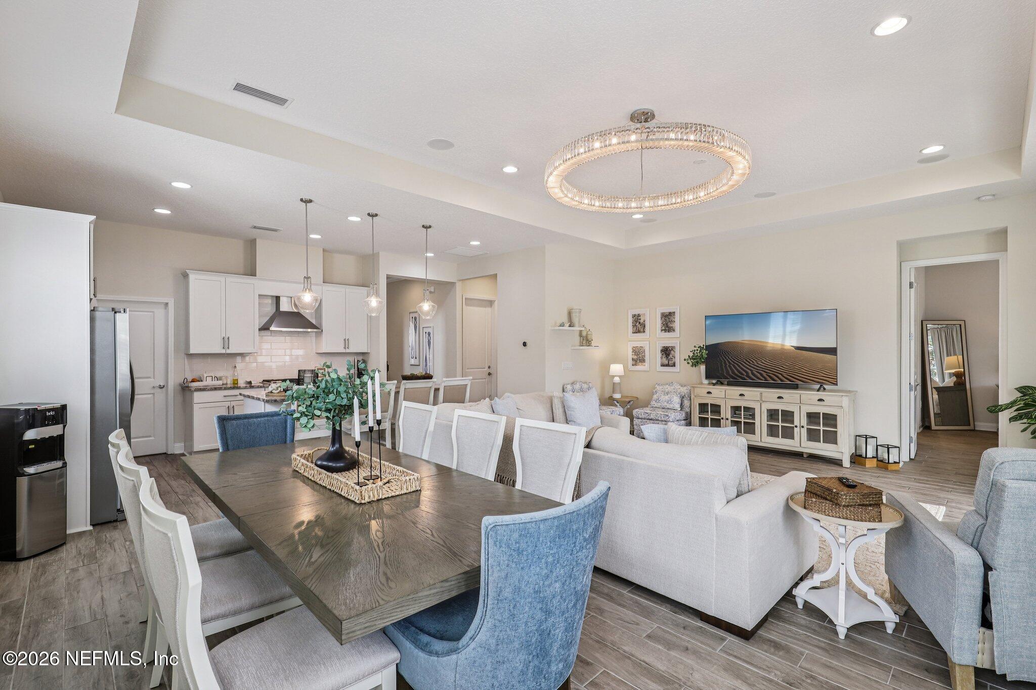 97 Rialto Drive Ponte Vedra, FL 32081 - Photo 48 of 48 a living room with fireplace furniture and a wooden floor