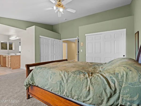 a white bath tub sitting next to a window