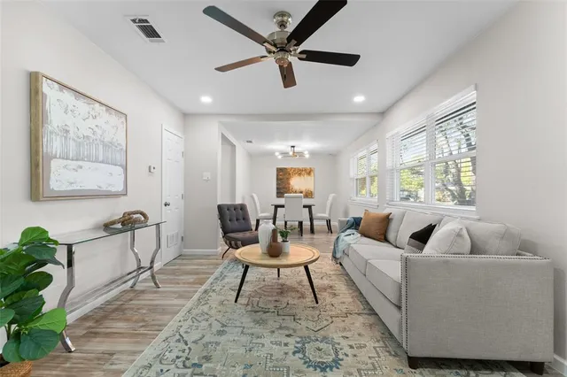 a living room with furniture and a window