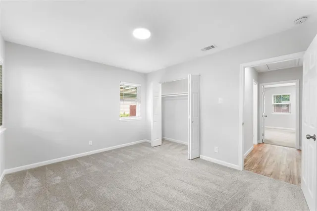 wooden floor and window in a room