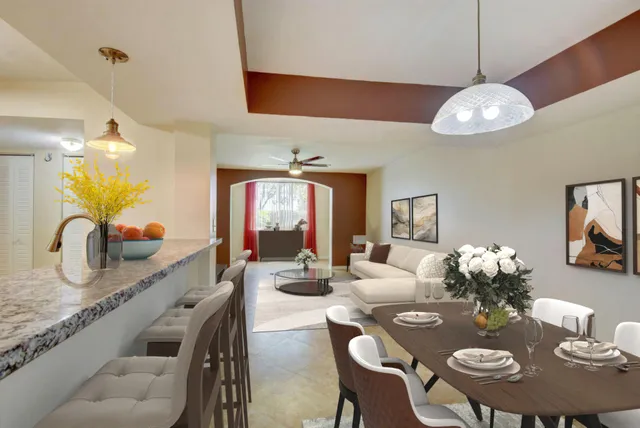 a view of a dining room with furniture wooden floor and chandelier