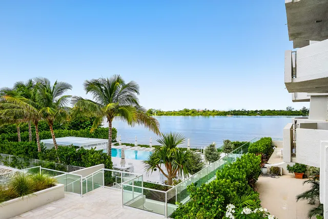 a view of a lake with a garden and lake view