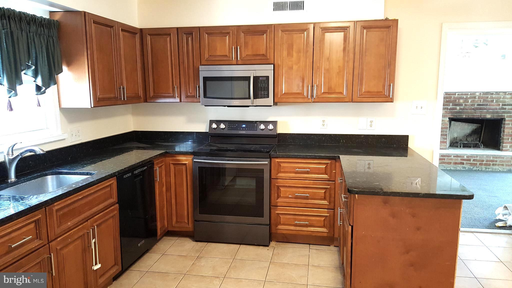 302 South Harrison Road Sterling, VA 20164 - Photo 6 of 24 Kitchen 17 x 13 .