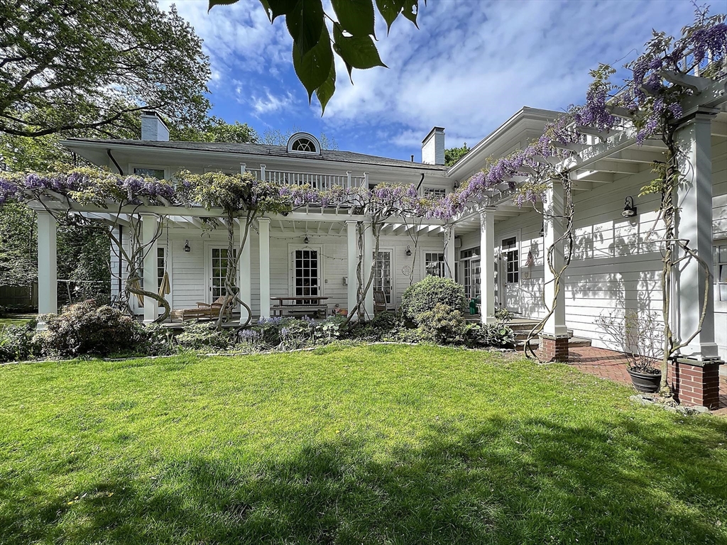 a view of a building with a yard