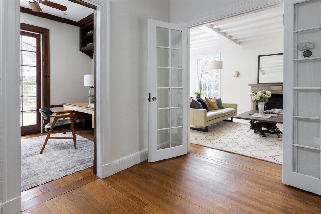 57 Hedge Road Brookline, MA 02445 - Photo 11 of 37 a living room with furniture and a wooden floor