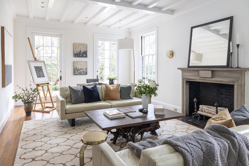 57 Hedge Road Brookline, MA 02445 - Photo 15 of 37 a living room with furniture and a fireplace