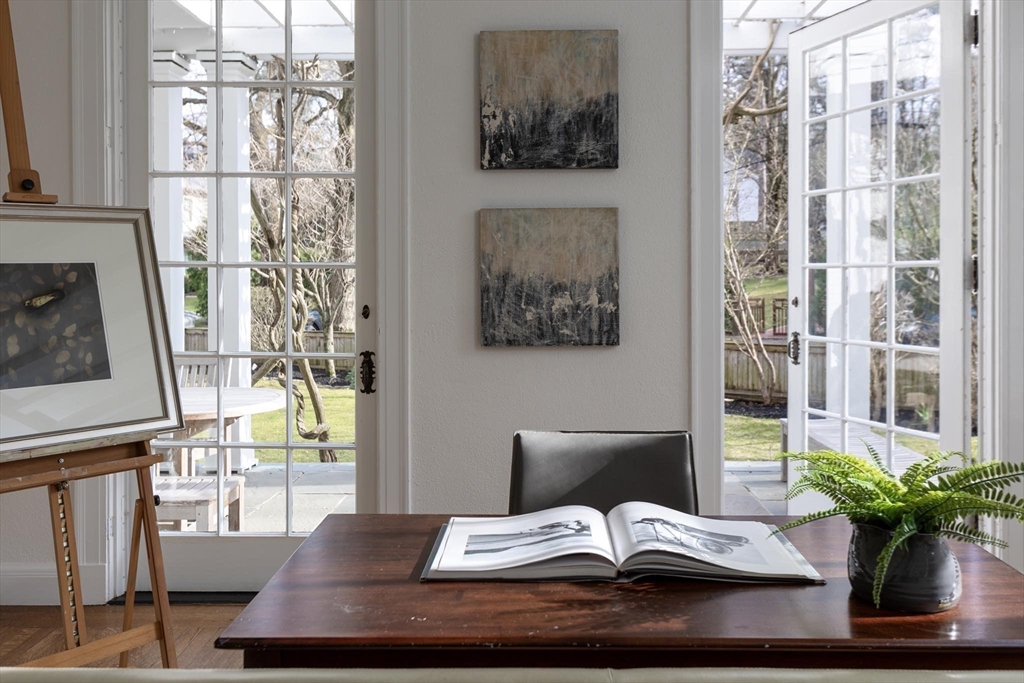 57 Hedge Road Brookline, MA 02445 - Photo 16 of 37 a view of a living room with furniture and a window