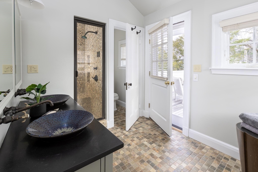 57 Hedge Road Brookline, MA 02445 - Photo 19 of 37 a view of a livingroom with furniture and front door