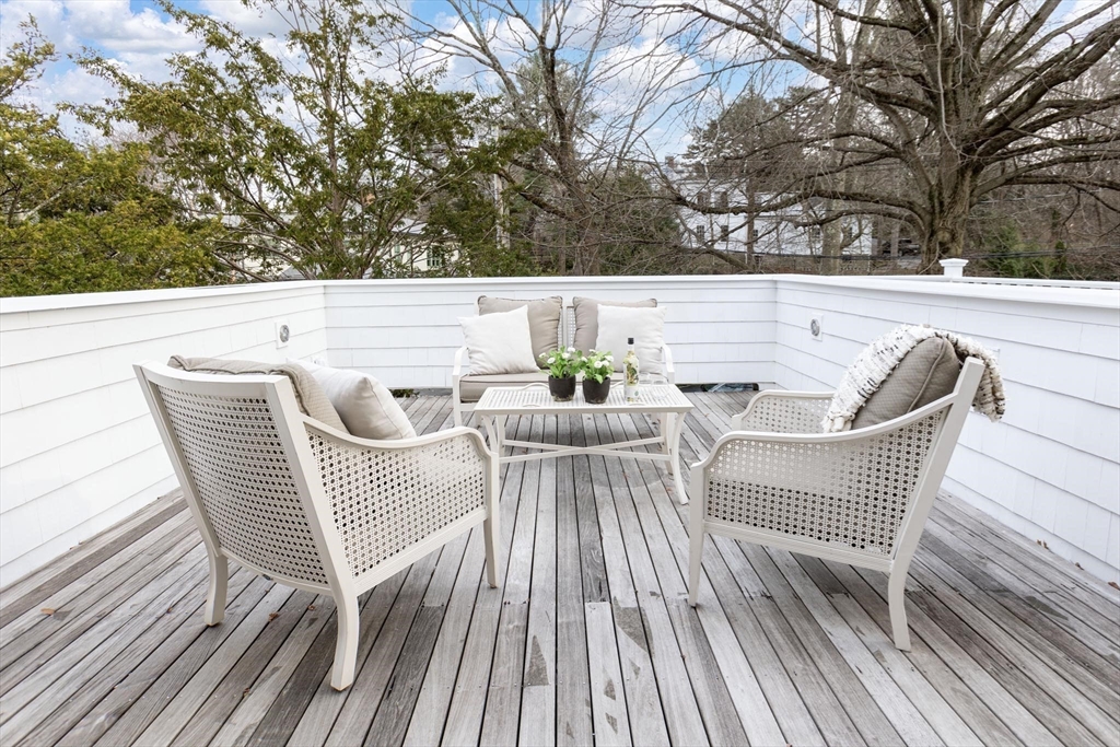 57 Hedge Road Brookline, MA 02445 - Photo 20 of 37 a view of sitting area with furniture and wooden floor
