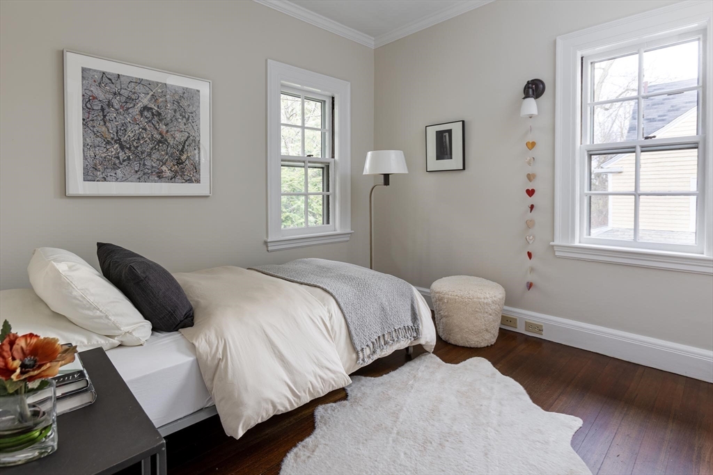 57 Hedge Road Brookline, MA 02445 - Photo 25 of 37 a bedroom with a bed and a window