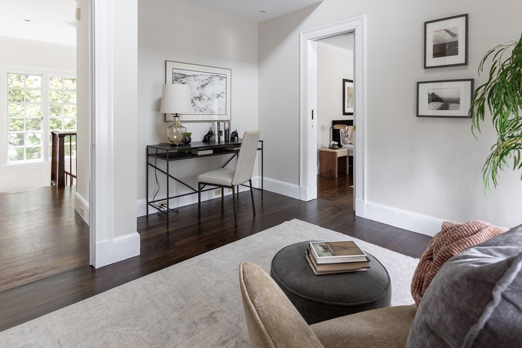 57 Hedge Road Brookline, MA 02445 - Photo 27 of 37 a living room with furniture and a wooden floor