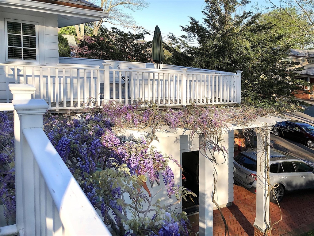 57 Hedge Road Brookline, MA 02445 - Photo 30 of 37 a view of street with wooden fence