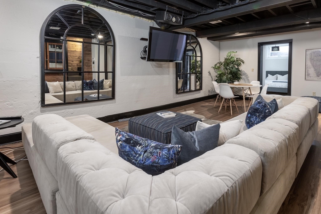 57 Hedge Road Brookline, MA 02445 - Photo 31 of 37 a living room with furniture and window