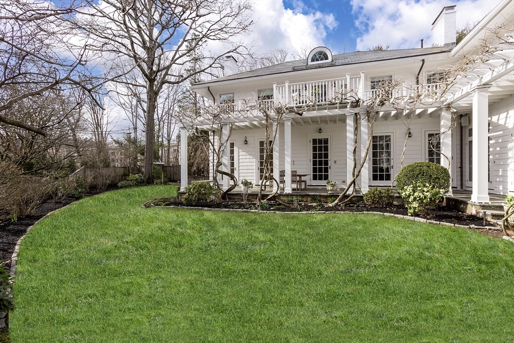 57 Hedge Road Brookline, MA 02445 - Photo 37 of 37 a front view of house with yard
