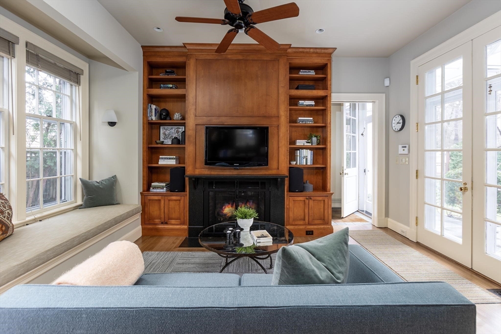 57 Hedge Road Brookline, MA 02445 - Photo 6 of 37 a living room with furniture and a fireplace
