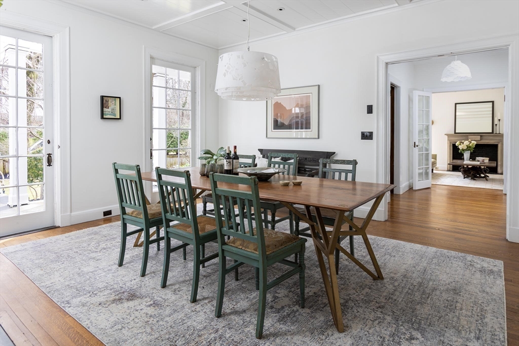 57 Hedge Road Brookline, MA 02445 - Photo 10 of 37 a view of a dining room with furniture and wooden floor