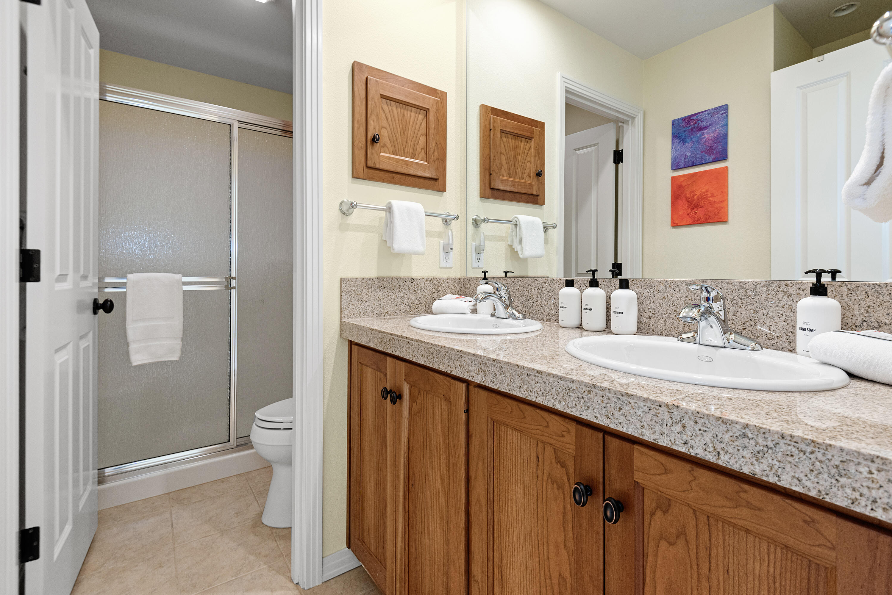 16775 Pony Express Way Bend, OR 97707 - Photo 26 of 38 a bathroom with a granite countertop sink mirror and toilet